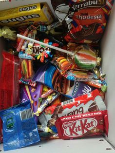 a box filled with lots of different types of candy