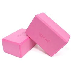 two pink soap bars sitting on top of each other