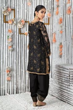 Onyx | Pakistani Designer Outfit | Sarosh Salman Festive Kurta With Resham Embroidery On Tissue Silk, Festive Tissue Silk Kurta With Zari Work, Designer Tissue Silk Kurta With Zari Work, Transitional Gold Chanderi Kurta, Gold Sharara With Sheer Dupatta In Raw Silk, Gold Raw Silk Sharara With Sheer Dupatta, Gold Anarkali Kurta With Sheer Dupatta, Straight Kurta In Tissue Silk With Dabka Work, Bollywood Style Kurta With Resham Embroidery In Tissue Silk