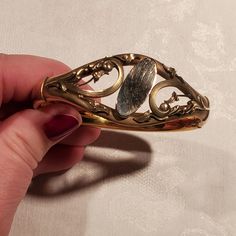 This beautiful Victorian bracelet is ready to be engraved! It was made by the W. S. Blackinton Co of Meriden CT. This piece is in lovely antique condition. I've shown it on my wrist which is 6 and 3/4 inches. Elegant Bronze Bangle Bracelet, Antique Gold Cuff Bracelet Collectible, Antique Hallmarked Yellow Gold Cuff Bracelet, Antique Yellow Gold Hallmarked Cuff Bracelet, Antique Brass Cuff Bracelet Collectible, Antique Engraved Yellow Gold Cuff Bracelet, Vintage Yellow Gold Hinged Cuff Bracelet, Formal Etched Bronze Jewelry, Antique Gold Bangle Bracelet