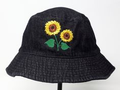 Item: flower embroidered bucket hat Material: 100% cotton Size: one size fits most Embroidery: machine embroidered Customization is open, please let me know if you want the design on a different color hat. Free first class shipping, upgradable priority mail service. 30 days return policy, feel confident at your purchase! Adjustable Bucket Hat With Embroidered Logo, Adjustable Bucket Hat With Embroidered Logo And Short Brim, Summer Cotton Hat With Embroidered Patch, Black Embroidered Logo Bucket Hat For Summer, Black Wide Brim Hat With Embroidered Logo, Black Embroidered Summer Hat, Embroidered Logo Bucket Hat, Adjustable Wide Brim Bucket Hat With Embroidered Logo, Embroidered Cotton Bucket Hat With Curved Brim