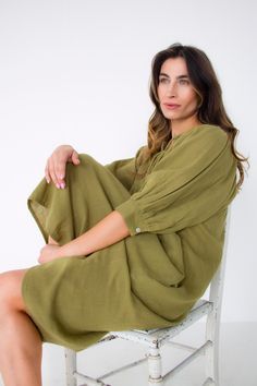 Meet Nira, In unique olive colour , our new addition to dress collection. This ageless and timeless piece is crafted from our new signature organic double cloth cotton known for its soft and breathable properties. The most flattering dress in the perfect shade .featuring romantic billowed sleeves. Cut to a regular shape with gathers for a gentle volume. Perfect for lazy summer days and leisurely brunches with your faves . Wear it with summer sandals or your favourite sneakers for that casual effortless look. Finished with must have slip pockets.      Details  crinkled cotton  machine washable  easy fit Mid length with 3/4 sleeves  sizes s/m  shoulder 14 inches chest 22 inches  length 42 inches  sleeves 16 inches   m/l shoulder 15 inches  chest 23 inches ( 46 around) length 42 inches  Made Green Knee-length Mini Dress With Gathered Sleeves, Casual Khaki Beach Dress, Solid Color Summer Dress With Relaxed Fit, Green Knee-length Puff Sleeve Summer Dress, Green Puff Sleeve Knee-length Dress For Summer, Solid Color Relaxed Fit Summer Dress, Relaxed Fit Solid Summer Dress, Casual Khaki Maxi Dress, Casual Khaki Dress For Vacation