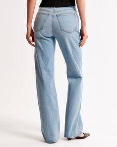 Step into the nostalgia of the 90s with Abercrombie & Fitch's Women's High Rise Relaxed Jeans, perfectly tailored to bring both style and comfort to your wardrobe. 

- Size: 34 LONG
- Color: Medium Wash
- Material: Body - Cotton, Elastane; Pocket Lining - Blend
- Gender: Female
- Fit: High rise (10.5”), fitted at waist and hips, relaxed full-length leg
- Features: Clean hem, vintage stretch fabric for added comfort

These jeans are designed to flatter your silhouette while offering the ease and Mid-rise Medium Wash Relaxed Fit Flare Jeans, Light Wash Straight Hem Jeans For Fall, Light Wash Straight Jeans For Fall, High Rise Relaxed Fit Jeans With Frayed Hem, Relaxed Fit Straight Leg Flare Jeans In Medium Wash, Light Wash Flare Jeans With Straight Hem For Fall, Mid-rise Relaxed Fit Everyday Jeans, Medium Wash Relaxed Fit Flare Jeans With Straight Hem, High Rise Relaxed Fit Flare Jeans In Rigid Denim