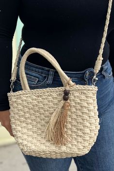 Cute small straw boho beach bag with shoulder strap. Dimensions: 7.5” x 11” Trendy Braided Shoulder Bag For Vacation, Bohemian Satchel Shoulder Bag For Beach, Cream Bohemian Shoulder Bag For Beach Season, Bohemian Cream Shoulder Bag For Beach Season, Braided Jute Bag For Vacation, Bohemian Cream Beach Bag For Beach Season, Handheld Beige Beach Bag With Braided Handles, Beige Handheld Beach Bag With Adjustable Strap, Beige Straw Bag With Braided Handles For Vacation