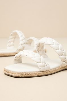 Step into summer with a fresh new look thanks to the Lulus Kennmar Off White Leather Braided Espadrille Slide Sandals! These smooth genuine leather sandals have a comfortable slide-on design, two braided straps, and a square toe bed. Sole is trimmed in beachy jute for a Boho-inspired finish. 0. 5" Rubber heel. Cushioned insole. Rubber sole has nonskid markings. Genuine leather upper. Balance man made materials. Imported. Lulus | Kennmar Off White Leather Braided Espadrille Slide Sandal Heels | S Leather Sandals For Summer Vacation, Woven Leather Sandals For Summer, Leather Wedge Sandals With Braided Straps For Vacation, Summer Sandals With Woven Leather For Spring, Spring Summer Sandals With Woven Leather, Leather Wedge Sandals With Braided Straps For Beach, Leather Wedge Sandals With Braided Straps For Summer, Adjustable Woven Leather Sandals For Summer, Summer Beach Sandals With Woven Leather