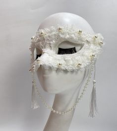 Pearl mask,White lace mask,tassel mask,Masquerade party mask,Beautiful mask,Court ball party,Dance mask,carnival masks,creative mask. Size: Adult size  Made of high-quality mild materials, comfortable to wear Usage scene: Halloween Carnival Party Mask,Christmas party, family party,Stage show, character playing,Clothing matching,cosplay, bar entertainment, carnival, festival ball party, birthday party, wedding party, costume ball, New Year party,live broadcast,school party，music festival, etc All Elegant White Masquerade Mask For Carnival, White Masquerade Mask For Halloween, White Adjustable Masks And Prosthetics For Masquerade, White Full Face Mask For Masquerade, Adjustable White Masks And Prosthetics For Masquerade, Elegant White Masquerade Mask For Mardi Gras, White Party Mask Costume Accessory, White Eye Mask For Costume Party, Full Face Masquerade Mask For Halloween Party