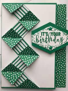 a green and white birthday card with polka dots