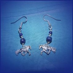 "Friesian Trot Horse Earrings Solid Sterling Silver 925 and Genuine Natural Lapis Lazuli Choose any color gemstone or crystal you like. Pictured is Lapis Lazuli - Gemstones such as onyx, and amethyst, coral and crystals and more are also available. These horse earrings are about 1 1/2\" length. They are from a line of hand carved and cast horse jewelry and are the left and right side of a trotting horse. Light weight for comfort, and sturdy solid chunk of sterling silver with great depth and det Traditional Hypoallergenic Drop Earrings, Traditional Hypoallergenic Sterling Silver Earrings, Silver Spiritual Hallmarked Earrings, Silver Southwestern Dangle Jewelry, Traditional Hypoallergenic Sterling Silver Jewelry, Traditional Round Lapis Lazuli Jewelry, Nickel Free Silver Lapis Lazuli Jewelry, Silver Lapis Lazuli Pierced Earrings, Silver Lapis Lazuli Round Earrings