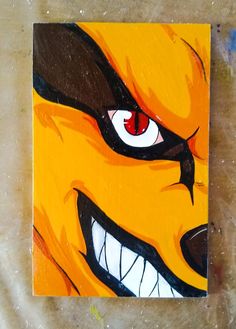 an orange and black painting with red eyes