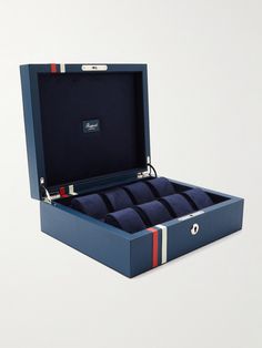 Your most prized timepieces deserve to be housed somewhere special. Offering space for up to eight watches, Rapport London's 'Greenwich' box is handcrafted from blue full-grain leather with red and white stripes that nod to the Union Jack. The plush suede interior and cushioned rolls keep every piece safe and secure. London Greenwich, Watch Box For Men, Leather Watch Roll, Mens Watch Box, Leather Watch Box, Watch Roll, Watch Winder, The Union, Watch Box