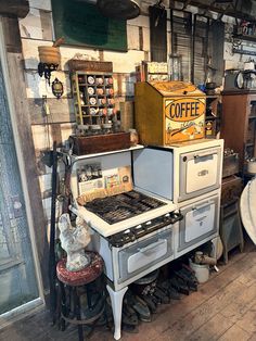 an old fashioned stove and oven in a shop