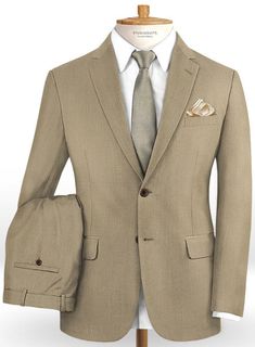 Revive the decades of standout looks with our Scabal Boston Khaki Wool Suit. Crafted from 100% wool, the khaki color of the suit is highly versatile and can make a surprisingly stylish alternative to traditional jacket, creating a flawless ensemble for special events and formal occasions. Simply team it up with a white formal shirt, maroon tie and polished black shoes to complete the look. 
 
 Look Includes  Scabal Boston Khaki Wool Fabric  Two Button Jacket Style  Notch Lapel  Real Horn Brown B Tailored Beige Suit With Single Button, Tailored Beige Suit In Suiting Fabric, Tailored Beige Suits In Suiting Fabric, Beige Single Breasted Suit With Notch Lapel, Beige Tweed Jacket With Suit Collar For Semi-formal Events, Beige Tweed Jacket With Suit Collar For Semi-formal Occasions, Beige Single-breasted Suit With Notch Lapel, Fitted Beige Suit For Fall, Fitted Beige Suits For Fall