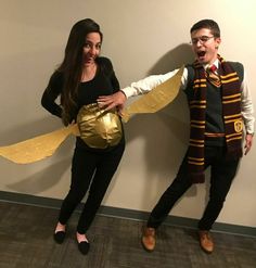 two people dressed in harry potter costumes