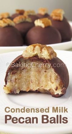 chocolate covered milk pecan balls on a white plate with the words condenseed milk pecan balls