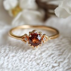 garnet ring Unique Simple Rings, Amber Engagement Rings, Red Engagement Ring Unique, Engagement Ring Without Diamond, Brown Gemstone Ring, Gold Engagement Ring Colored Stone, Orange Gemstone Ring, Earthy Rings Engagement, Amber Wedding Ring