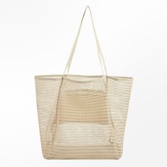 Embrace the carefree spirit of summer with our Breezy Mesh Beach Tote. Designed to be your stylish companion for sun-soaked days, this tote effortlessly combines fashion and functionality. Crafted from lightweight mesh material in a versatile neutral hue, it offers a breathable and airy feel, perfect for carrying your beach essentials while keeping everything sand-free. Product code: CAC12F4E003GG Beige Lightweight Beach Bag, Lightweight Beige Summer Beach Bag, Lightweight Beige Beach Bag, Trendy Cream Beach Bag For Beach Season, Lightweight Beige Beach Bag For Vacation, Summer Cream Beach Bag For Beach Season, Daily Use Mesh Shoulder Bag, Cream Beach Bag For Daily Use, Cream Beach Bag With Large Capacity