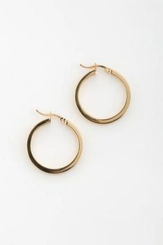 Please note all sales are final. A flawless medium between an everyday dainty look and a bold, sexy hoop. Content + Care Gold: 14k Gold Vermeil Silver: .925 Sterling Silver Wipe clean Handcrafted with love in Montreal Size + Fit O/S | Deux Lions Jewelry Donna Hoop Earring in Gold, Women's at Urban Outfitters Everyday Small Yellow Hoop Jewelry, Nickel Free Yellow Hoop Jewelry, Lion Jewelry Woman, Trendy Yellow Gold Nickel-free Hoop Earrings, Luxury Tarnish Resistant Gold-tone Hoop Earrings, Gold Vermeil, Montreal, Silver 925, Urban Outfitters