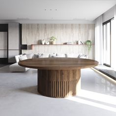 a large wooden table sitting in the middle of a room