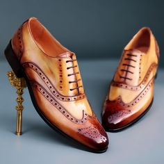 Step into sophistication with these Italian Patent Leather Wingtip Brogue Shoes for Men. Crafted with exquisite attention to detail, these fashion-forward shoes blend classic style with modern flair. The glossy patent leather exterior exudes elegance, while the intricate wingtip and brogue detailing add a touch of refinement. Perfect for formal occasions or adding a dash of dapper charm to everyday wear, these shoes are sure to elevate any ensemble. 100% Original Handmade Premium Quality Leather Men Fashion Shoes, Man Dressing Style, Groom Shoes, Leather Boot Shoes, Brogue Shoes, Mens Oxfords, Mens Casual Outfits, Shoes For Men, Handmade Shoes