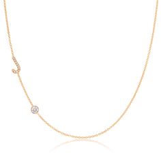 The Monogram Pavé Necklace With Diamond is a timeless piece that combines elegance and personalization. Each necklace showcases a radiant pavé letter of your selection, perfectly complemented by a captivating diamond. Every 2.5mm diamond is meticulously set within a 3mm gold bezel and seamlessly soldered onto our signature delicate chain. This necklace will ship within 1 week. Need it sooner? Contact us. Details • Made in Los Angeles • Each necklace is solid 14k gold • Each diamond is 2.5 mm in Classic Diamond Initial Necklace For Anniversary, Fine Jewelry Diamond Initial Necklace With Accents, Elegant Rose Gold Diamond Initial Necklace, Classic Initial Necklace With Single Diamond For Anniversary, Rose Gold Diamond Initial Necklace For Anniversary, Diamond Initial Necklace For Formal Occasions, Fine Jewelry Diamond Initial Necklace For Formal Occasions, Classic Diamond Necklace With Initials For Formal Occasions, Classic Diamond Necklace With Initials For Formal Events