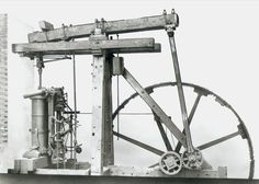 an old black and white photo of machinery