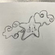 a pencil drawing of a starfish on paper