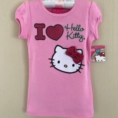 In Pink. Product Features Crewneck Short Sleeves Glitter Graphics Fabric & Care 100% Cotton Machine Wash Imported Sanrio Shirts, Bow Shorts, Glitter Graphics, Crazy Girls, School Fits, Girly Outfits, Pink Bow, Aesthetic Outfits, Short Sleeve Top