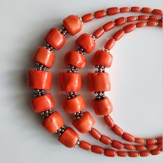 < Orange coral beaded necklace > This product made according to the model of authentic traditional Ukrainian jewelry. The coral is modern, the design is vintage. Like 99% of the coral on the market these days, this coral has been dyed. I use bamboo coral which is not endangered or threatened in any way, unlike natural pink or red coral (the production of which is forbidden almost everywhere in the world). Bamboo coral doesn't mean it's not organic. Every bead of it has a distinctive and be Ukrainian Jewelry, Coral Beads Necklace, Fashion Traditional, Bamboo Coral, Ethnic Necklaces, Orange Coral, Natural Coral, Coral Necklace, Coral Jewelry