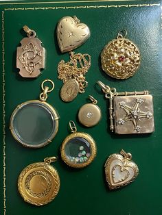 "A collection of beautiful antique and vintage lockets in solid yellow gold - ready for you to add your own photos and memories! Sold individually. 1. 14k bell-shaped locket, with ruby. Opens from the bottom. Engine-turned interior, florentine details on exterior. 6.78g, 1\"X 1\". 2. 14k heart locket, with etched decoration and star-set diamond. Matte finish. 3.95g, 1\" x 0.75\". 3. 14k heart locket with mother of pearl inlay, ca. 1930. 3.53g, 1\" x 0.75\". [SOLD OUT] 4. 18k antique Victorian ci Luxury Heirloom Jewelry Hallmarked, Luxury Antique Jewelry For Vintage Events, Luxury Traditional Locket Jewelry, Luxury Heirloom Jewelry For Commemoration, Luxury Vintage Pins As Gifts, Luxury Antique Jewelry For Memorial, Traditional Luxury Locket Jewelry, Luxury Antique Jewelry From Vintage Collection, Luxury Historical Jewelry For Gift