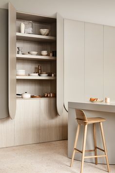 the kitchen is clean and ready to be used for cooking or eating, while also being used as a pantry