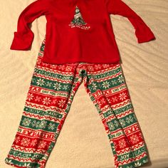 Unisex Christmas Pajamas. Tags Still Attached. Christmas Sleep Sets With Long Sleeves, Christmas Bedtime Long Sleeve Sets, Holiday Long Sleeve Sleepover Sets, Holiday Bedtime Sets With Long Sleeves, Family Matching Holiday Festive Sleepwear, Red Holiday Sets For Sleepover, Festive Holiday Sleepwear, Festive Holiday Long Sleeve Sleepwear, Festive Long Sleeve Holiday Sleepwear