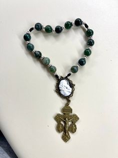 "Welcome to my Shop \"CREATING STILL MOMENTS.\"   To see all my listings and offerings, please visit my shop at  https://www.etsy.com/shop/CreatingStillMoments?ref=sh-carousel-1  St Andrew Christmas Novena Chaplet green semi precious beads Madonna centerpiece mom gift Catholic gift Catholic mom Advent prayer  The Saint Andrew Christmas Novena is a simple, yet popular devotion. It starts on St Andrew's feast day Nov. 30th and is prayed until Christmas. This one is made with semi precious Turquois Bohemian Beaded Rosary Bracelet As Gift, Bohemian Round Beads Jewelry For Mother's Day, Handmade Jade Beaded Bracelets As Gifts, Beaded Rosary With Oval Beads As Gift, Handmade Rosary With Round Beads As Gift, Handmade Jade Beads For Gifts, Gift Oval Agate Beads Jewelry, Agate Beads For Gifts, Oval Natural Stones For Gifts