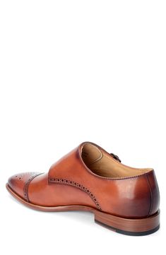 Burnished Italian leather adds rich color and depth to this dapper monk-strap loafer featuring intricate broguing and a supportive dual-density insole. Cushioned EVA footbed with arch support Leather upper, lining and sole Imported Timeless Slip-on Dress Shoes With Brogue Detailing, Classic Cap Toe Monk Strap Shoes With Branded Insole, Business Casual Monk Strap Shoes With Almond Toe, Timeless Wingtip Dress Shoes With Leather Footbed, Timeless Monk Strap Slip-on Shoes For Semi-formal Occasions, Elegant Slip-on Monk Strap Shoes, Business Casual Monk Strap Shoes With Leather Footbed, Business Casual Monk Strap Shoes With Leather Sole, Wingtip Dress Shoes With Branded Insole And Slip-on Fit