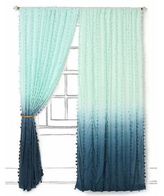 the curtains are hanging on the wall by the window with blue and green ombreed drapes