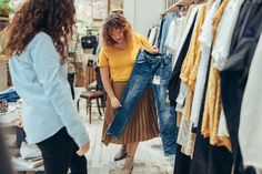 Fashion store owner showing a jeans to female customer. Shop assisting helping shopper in clothing store. Nonprofit Branding, Shopify Marketing, Branding Session, Store Owner, Employer Branding, Clothing Retail, People Shopping, Email Campaign, Lifestyle Clothing