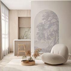 a living room with a painting on the wall next to a chair and potted plant