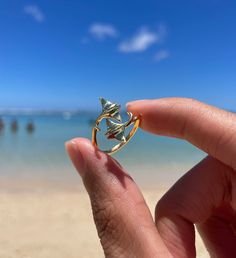 This ring, part of the Au'au Channel Whales Collection, is crafted from high-quality 925 sterling silver and features a pair of twin sterling silver manta rays.  The Au'au Channel, meaning "taking a bath," is a body of water located between the islands of Maui and Lanai. Known for its calm waters, it serves as a refuge in the Pacific Ocean and a mating ground for humpback whales. The channel is also home to graceful manta rays, often seen roaming around its shallow, tranquil waters. This adjusta Luxury Ocean-inspired Rings For Gift, Ocean Gold Ring, Ocean Rings, Marine Jewelry, Manta Rays, Surf Jewelry, Beachy Jewelry, Preppy Jewelry, Calm Waters