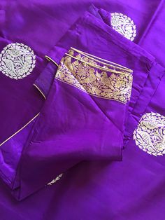 This is a beautiful handloom katan silk light weight banarasi in deep purple/ egg plant shade with beautiful sona rupa bird motifs in body and floral and bird motifs in gold zari in pallu, all in kadua weave. Saree comes with a stitched blouse in standard size 36-38. Saree is finished with tassels and falls and pico are done.  *colour may vary slightly due to lighting and individual device settings. *Falls and Pico- Yes * Tassels-Yes *Blouse-yes, standard size 36 with margin for size 38 * All sales are final * Dry clean only * Handloom products may have some irregularities Elegant Purple Kurta With Pallu, Traditional Drape Purple Kurta With Cutdana, Purple Art Silk Kurta With Dupatta, Silk Purple Sets For Diwali, Purple Silk Sets For Diwali, Purple Art Silk Kurta With Zari Work, Purple Raw Silk Kurta With Traditional Drape, Purple Chanderi Sets For Festivals, Purple Banarasi Silk Saree With Self Design