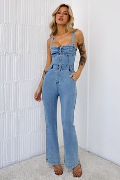 Length from bust to hem of size S: 130cm. Jumpsuit. Unlined. Model is a standard XS and is wearing size XS.  True to size.  Non-stretch.  Front zip. Adjustable straps. Belt loops. Pockets. Cold hand wash only.  Polyester/Cotton. Are you ready to turn heads? Look no further than the ultimate party piece – the Deep In Motion Jumpsuit! Featuring pockets and adjustable straps. Wear with a pair of heels to complete your chic ensemble and get ready to make an unforgettable entrance. Jumpsuit Denim, Long Bodycon Dress, Concert Tshirts, Mini Dresses Summer, Long Sleeve Bodycon Dress, Denim Jumpsuit, Corset Dress, The Deep, Jeans Dress