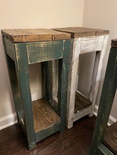 two wooden tables sitting next to each other on top of a hard wood floored floor