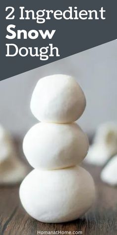 two white rocks stacked on top of each other with the words, 2 ingredient snow dough