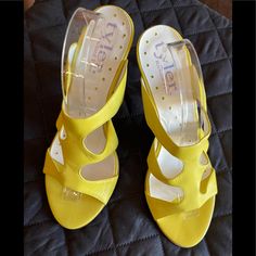 Bright Yellow Cutout Sandal Slip On Heels. Pop Of Color Adds To Any Outfit! Size Is 7 1/2. Heels Are Approximately 3 1/2” High. Nwot. Never Worn. New Condition. Perfect For Summer! Questions Please Ask! Offers Welcome Summer Questions, Richard Tyler, Slip On Heels, Yellow Sandals, Bright Yellow, Shoes Women Heels, Sandals Heels, Color Pop, Shoes Heels