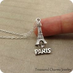 This Eiffel Tower Charm necklace comes on a silver-plated chain that is available in different lengths. Please choose your desired length from the drop-down menu when placing the item in your shopping cart. { CHARM DETAILS }★ Material: Pewter ★ Finish Color: Silver★ Measurements: 1/2" x 1"★ Dimensions: 3-Dimensional★ Made in the USA{ SIMILAR ITEMS } More travel and landmark items available from my shop: https://www.etsy.com/shop/treasuredcharms/search?search_query=landmark{ GIFT OPTIONS}Gift box Meaningful Nickel-free Pendant Charm Necklace, Silver Chain Metal Charm Necklace As Gift, Themed Adjustable Silver Charm Necklaces, Adjustable Themed Silver Charm Necklaces, Adjustable Silver Themed Charm Necklaces, Themed Sterling Silver Necklace, Vintage Style Personalized Silver Charm Necklace, Themed Sterling Silver Necklace In Silver, Silver Themed Necklace For Gift