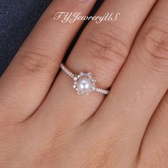 Pearl engagement ring Rose gold Pink Akoya Pearl Ring Women Natural diamond halo wedding ring June birthstone Half eternity cluster vintage ✨ This listing sells the main ring only - other jewelry pieces shown in the pictures are for reference only. Click it to get the bridal set: https://www.etsy.com/listing/1033341113 https://www.etsy.com/listing/1030291721 Items Description: Engagement Ring: * Center stone: Natural Akoya Pearl, 5MM, Round Cut * Accents: Natural Diamonds, VS clarity, G color, 0 Dainty Round Halo Setting Wedding Ring, Diamond Pearl Ring With Halo For Wedding, Round Cut Pearl Ring With Halo Setting For Wedding, Diamond Halo Pearl Ring For Wedding, Pearl Promise Ring With Halo Setting, Round Cut Halo Setting Pearl Wedding Ring, Wedding Pearl Ring With Diamond Halo, Anniversary Pearl Ring With Halo Setting, Anniversary Pearl Ring With Halo Setting And Cubic Zirconia