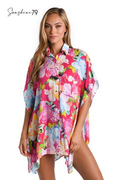 Model is wearing a colorful floral resort shirt cover up from the Sunshine 79 Expressive Garden Collection Floral Print Tops With Camp Collar For Day Out, Pink Summer Hawaiian Shirt With Relaxed Fit, Spring Hibiscus Print Shirt With Camp Collar, Pink Relaxed Fit Hawaiian Shirt For Summer, Spring Multicolor Hawaiian Shirt With Camp Collar, Multicolor Hawaiian Shirt With Camp Collar For Spring, Pink Short Sleeve Camp Shirt For Vacation, Pink Short Sleeve Camp Shirt For Beach, Pink Camp Collar Top For The Beach