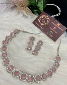 Beautiful Bridal Ad Necklace set. Perfect engagment set, bridal set, eid jewelry.Pink, Maroon, Emerald,Mint Ad diamond look set. Material- American Diamond. Color Avavilable  - Mint -Pink -Maroon - Emerald Green High End Quality 100% Satisfaction Guarantee: Long Lasting Plating, High-Quality Stones. Perfect for any occassion- weddings, partywear Jewelry. Care: It is advisable that you keep our products away from direct heat, humidity, and moisture.Please do not use Perfume on the products. Please Follow us on Instagram: https://instagram.com/krishmadesigns?utm_medium=copy_link Note: Free Shipping over $75. Contact us for any question! S.no-394 Ad Necklace Set, Black And Gold Outfit, Pink Jewelry Set, Gold Outfit, Diamond Necklace Set, Pink Jewelry, American Diamond, Bridal Set, Bridal Sets