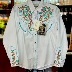 Rafael Amaya By Rangers White Western Shirt Teal And Brown Embroidery Snap Buttons. Casual White Top With Relaxed Fit, Traditional Fit White Top, Traditional Fit White Shirt For Spring, White Traditional Fit Shirt For Spring, Traditional White Top, White Regular Fit Shirt For Spring, Traditional White Tops, Traditional Fit Embroidered Shirt For Spring, Spring Embroidered Traditional Fit Shirt