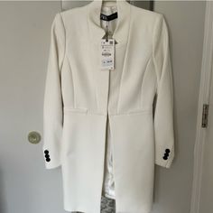 Zara Blazer Jacket Cream Small Nwt Fitted Long Sleeve Blazer In Winter White, Fitted Winter White Long Sleeve Blazer, Zara Fitted Outerwear For Office, Fitted Winter White Blazer, Fitted Zara Outerwear For Office, White Fitted Blazer With Stand Collar, White Stand Collar Outerwear For Formal Occasions, White Stand Collar Outerwear For Formal Events, Winter White Long Sleeve Formal Outerwear