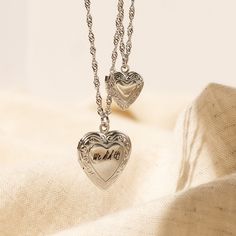 Our Engraved Heart Locket can be engraved with initials, words, or short messages for the perfect gift for your loved ones! Materials & Finish: * High Quality 316L Stainless Steel * 18k Gold, Silver We use a THICK PLATING for a piece that will be in your jewelry box for years to come! Size Specs: * Small Heart Locket Pendant: 13mm * Big Heart Locket Pendant: 20 mm HOW TO ORDER * Select your Chain type & Length * Select your Engraving Options * Tell us all your item details in the personalization Personalized Heart Charm Necklace As Gift, Personalized Heart Charm Necklaces As Gift, Personalized Heart Charm Necklaces For Gift, Personalized Heart Charm Necklace For Gift, Vintage Personalized Double Heart Necklace, Personalized Vintage Silver Heart Necklace, Vintage Personalized Heart Necklace, Dainty Personalized Locket Necklace For Gift, Dainty Engraved Locket Necklace As Gift