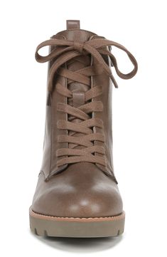 This classic combat boot with a cushioned EVA footbed and lightweight sole is a comfy go-to for grounding casual looks. 1 1/2" heel; 1" platform (size 8.5) 6" shaft Leather upper/textile lining/synthetic sole Imported Fall Lace-up Boots With Lug Sole And Medium Width, Fall Lace-up Boots With Lug Sole, High-top Combat Boots With Leather Footbed For Fall, Brown Lace-up Platform Combat Boots, Ankle-high Combat Boots With Leather Footbed For Fall, Fall Ankle-high Combat Boots With Leather Footbed, Fall Ankle-high Leather Combat Boots, Ankle-high Combat Boots For Fall, Casual Combat Boots With Lug Sole For Fall